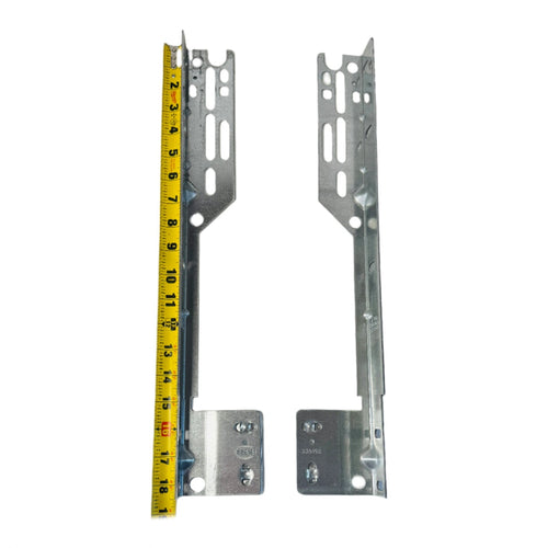 Torquemaster Flag Angle Brackets for 12" radius garage door track, with measuring tape for size reference.